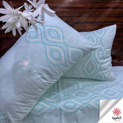 طقم ملاية مطرز عنو بتصميم عيون فخم – 4 قطع 5123