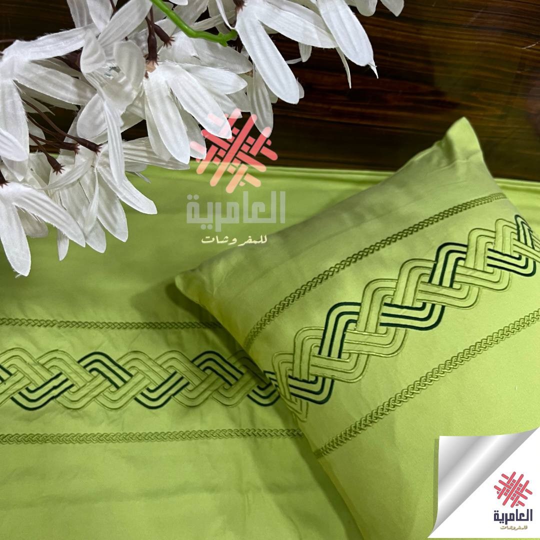 طقم عقدة مطرز